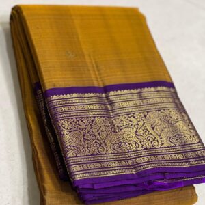 Mustard Yellow Kanjivaram saree with Purple Border