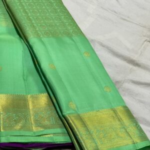 Kanjivaram saree In Pastel Green With Purple Combination