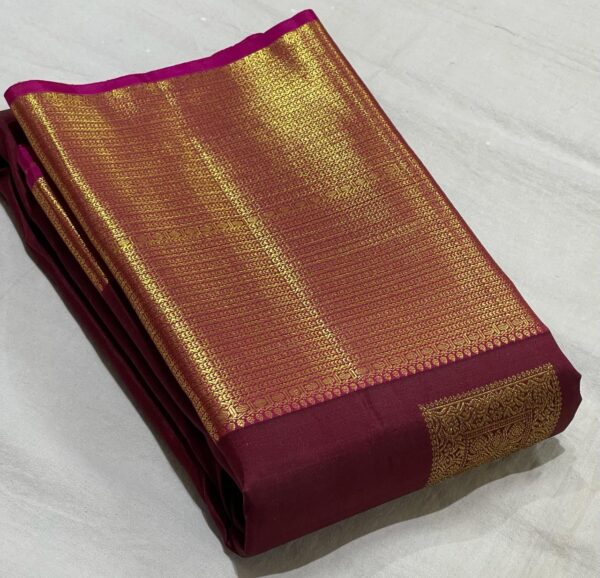 Maroon red kanjivaram silk sareesIn Simple Butta Design For Bride