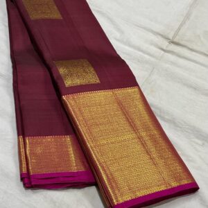 Maroon Kanjivaram Saree In Simple Butta Design For Bride