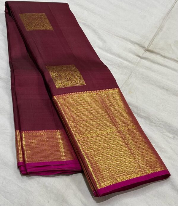 Maroon Kanjivaram Saree In Simple Butta Design For Bride