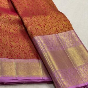 Orange Kanjivaram saree With Pastel Pink Border