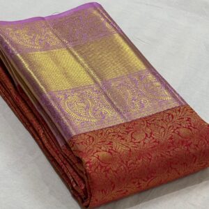 Orange Kanjivaram saree With Lavender color Border