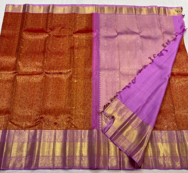 Orange Kanjivaram saree With Pastel Pink Border