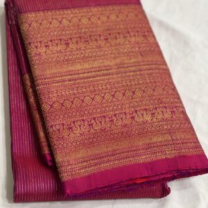 Kanjivaram Silk Saree in Self Magenta with Gold Zari Lines