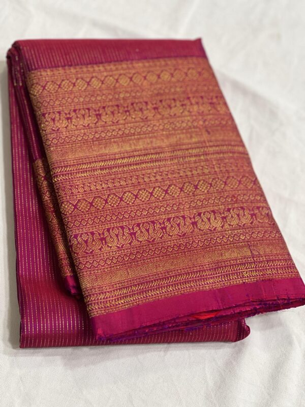 Kanjivaram Silk Saree in Self Magenta with Gold Zari Lines