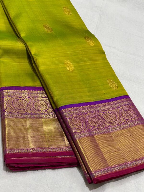 Kanjivaram Silk Saree in Leaf Green with Purple Border