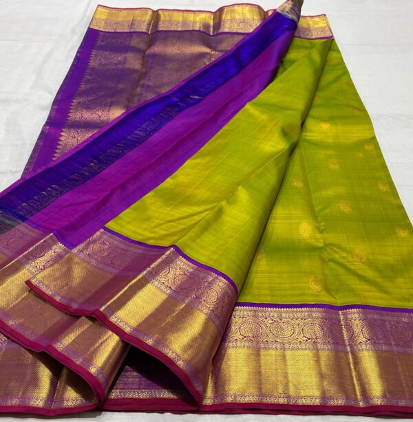 Kanjivaram Silk Saree in Leaf Green with Purple Border