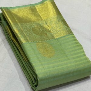 Kanjivaram Silk Saree in Pista Green with Purple Pallu and Blouse