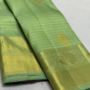 Kanjivaram Silk Saree in Pista Green with Purple Pallu and Blouse