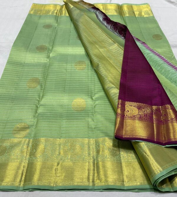 Kanjivaram Silk Saree in Pista Green with Purple Pallu and Blouse