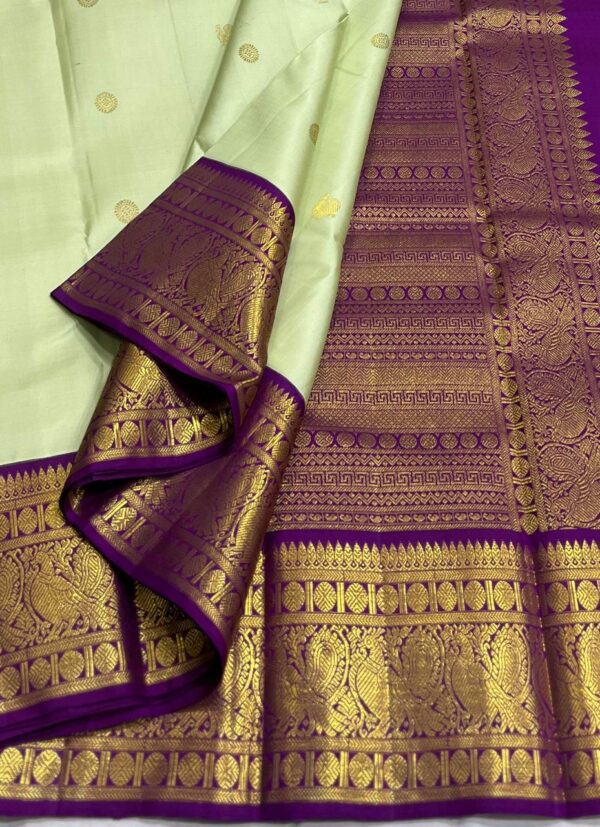 Kanjivaram Silk Saree in Pista Green with Purple Border