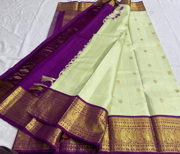 Kanjivaram Silk Saree in Pista Green with Purple Border