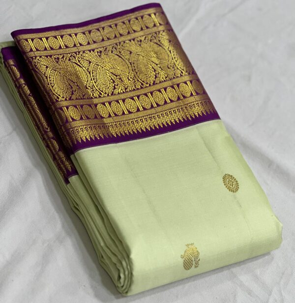 Kanjivaram Silk Saree in Pista Green with Purple Border