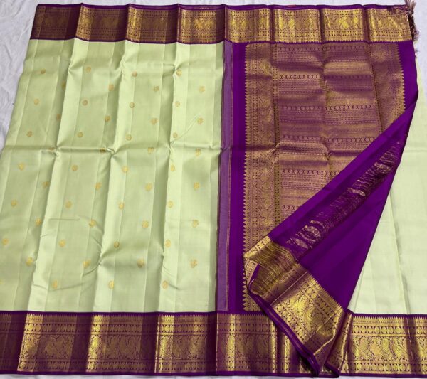 Kanjivaram Silk Saree in Pista Green with Purple Border