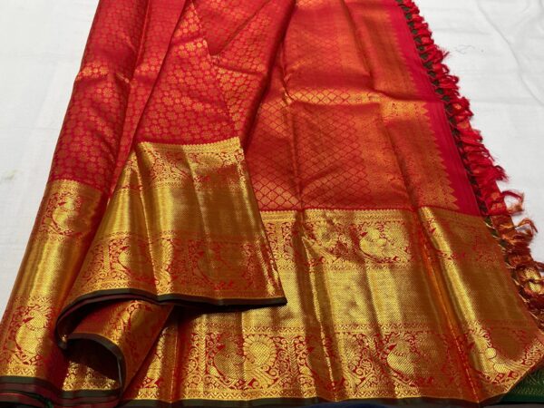 Red Kanjivaram silk saree in big border for wedding