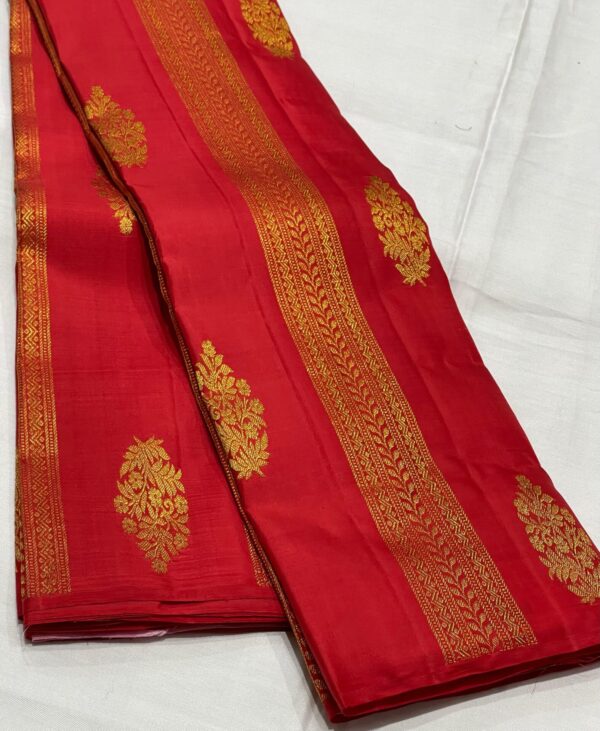 Red Kanjivaram silk saree With Pink Pallu And Blouse