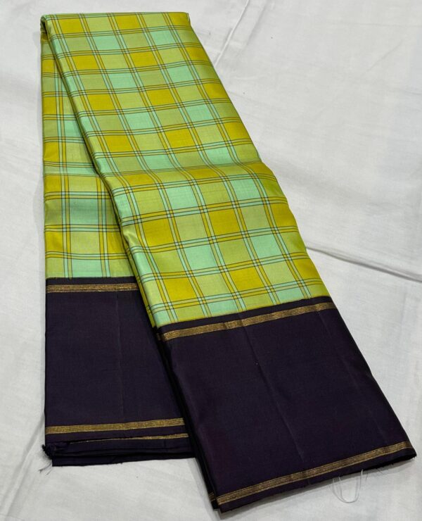 Kanjivaram Silk Saree with Multi-Shade Body, Black Border, and Multi-Shade Checks Design