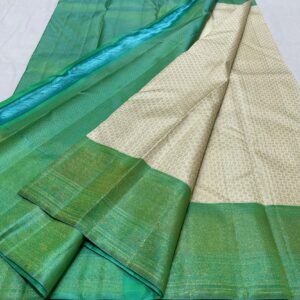 Kanjivaram Silk Saree in Cream with Pastel Green Border