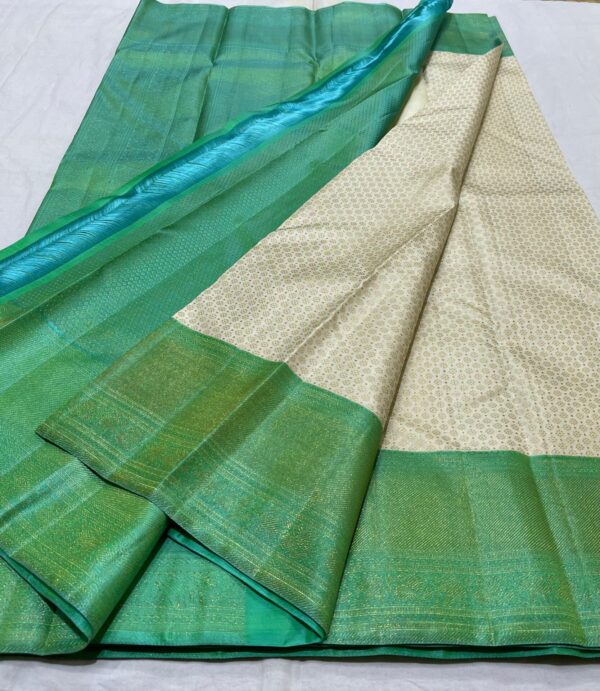 Kanjivaram Silk Saree in Cream with Pastel Green Border