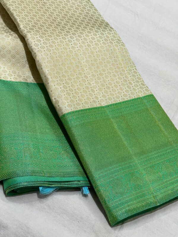 Kanjivaram Silk Saree in Cream with Pastel Green Border