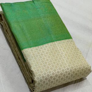 Kanjivaram Silk Saree in Cream with Pastel Green Border