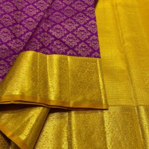 Kanjivaram silk saree in purple body color with mango yellow