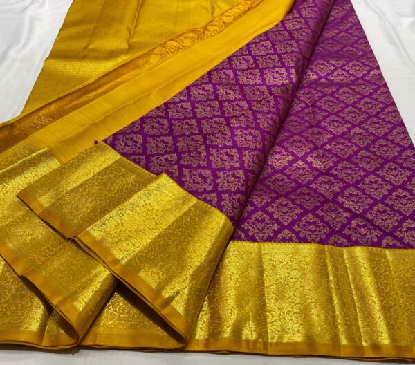 Kanjivaram silk saree in purple body color with mango yellow