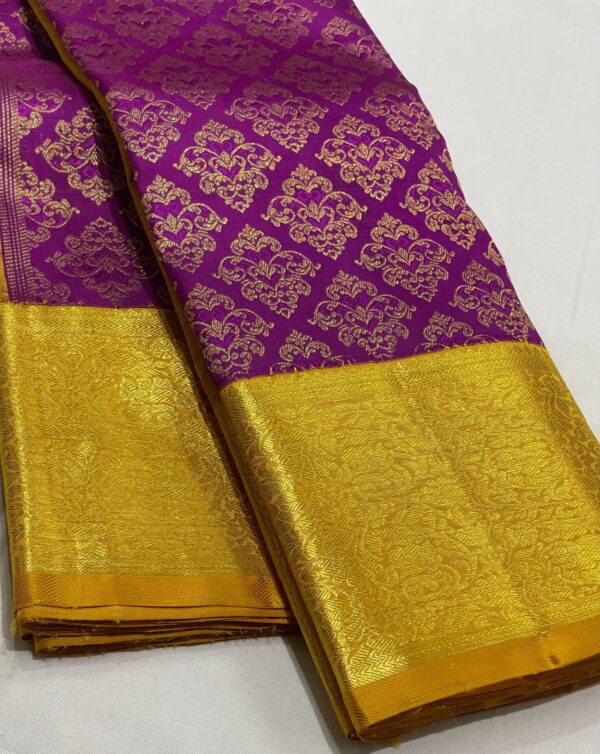 Kanjivaram silk saree in purple body color with mango yellow