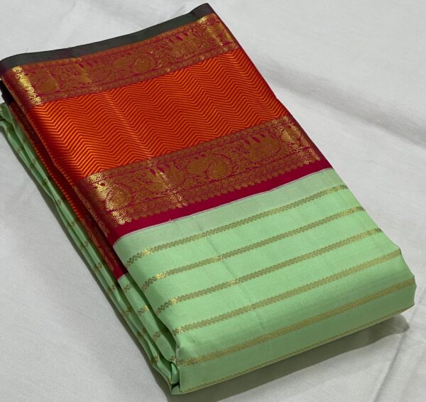 Kanjivaram Silk Saree in Mint Green with Red Retta Patta Border