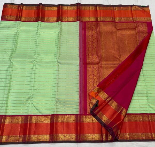 Kanjivaram Silk Saree in Mint Green with Red Retta Patta Border