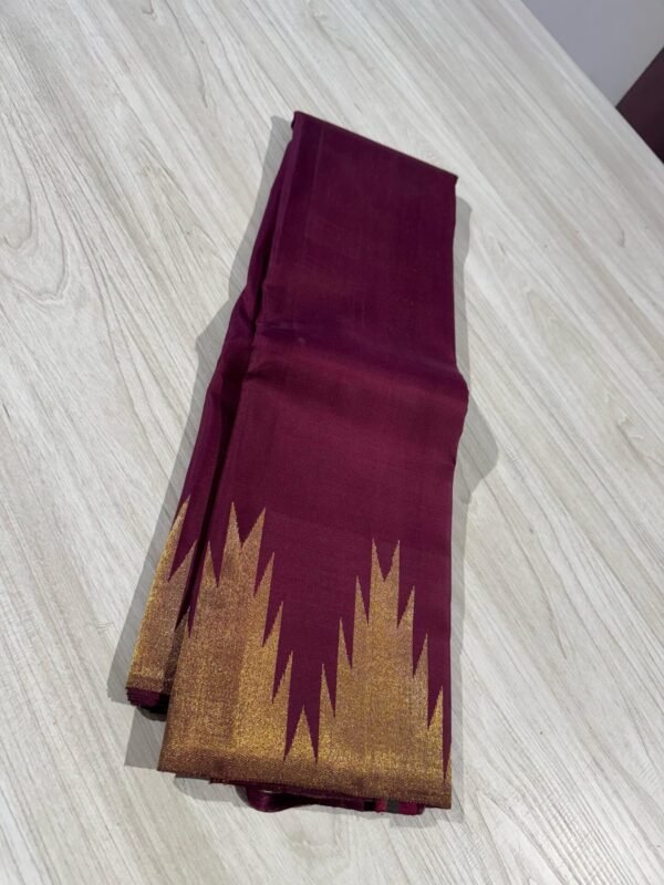 Maroon Kanchipuram silk saree In Temple Border