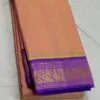 Peach kanchipuram SIlk Saree In Purple Border