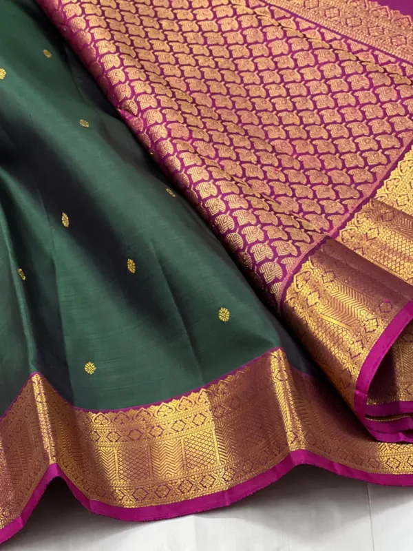 Green Kanchipuram Silk saree With Dark PInk Border