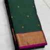 Green Kanchipuram Silk saree With Dark PInk Border