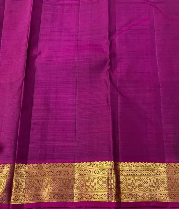 Green Kanchipuram Silk saree With Dark PInk Border