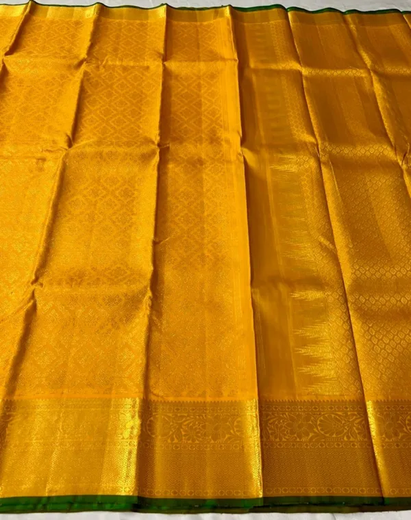 Mango Yellow Kanchipuram silk Saree In Green Edge