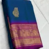 Kanchipuram Silk Saree In Peacock Blue With Dark Pink