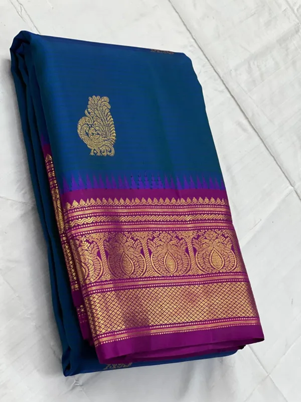 Kanchipuram Silk Saree In Peacock Blue With Dark Pink