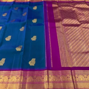 Kanchipuram Silk Saree In Peacock Blue With Dark Pink