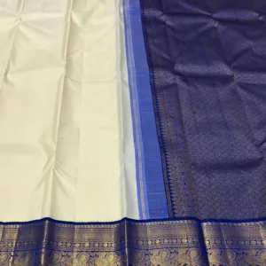 Plain Off White Kanchuipuram Silk Saree n lue Border