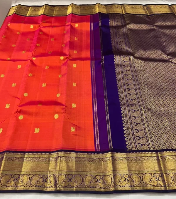 Red Kanchipuram Silk Saree With Blue Border