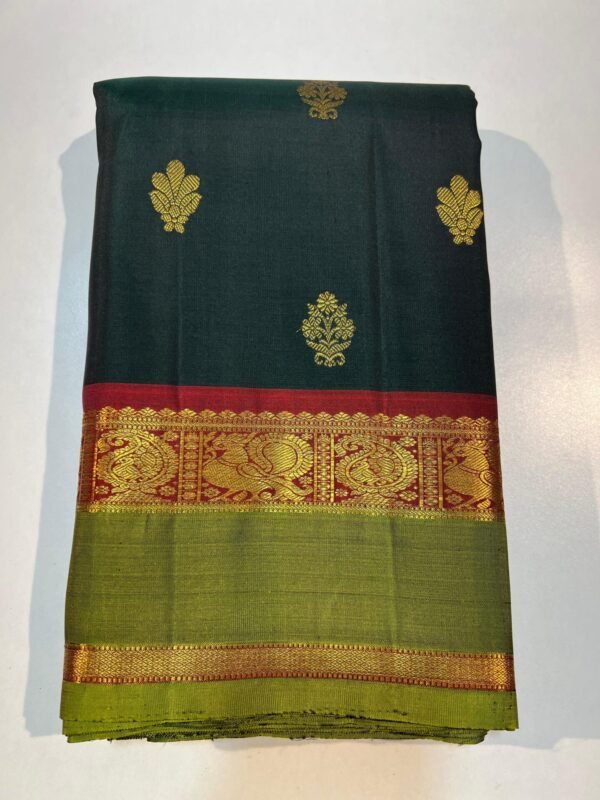 Green Kanchipuram Silk Saree With Rette Patta Border