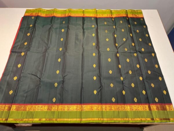 Green Kanchipuram Silk Saree With Rette Patta Border