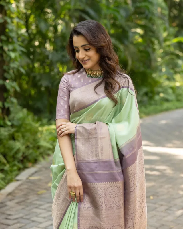 Trisha Krishnan Stuns in Elegant Pista Green Kanjivaram Silk Saree with Lilac Border – A Timeless South Indian Style Statement 2 Trisha Krishnan
