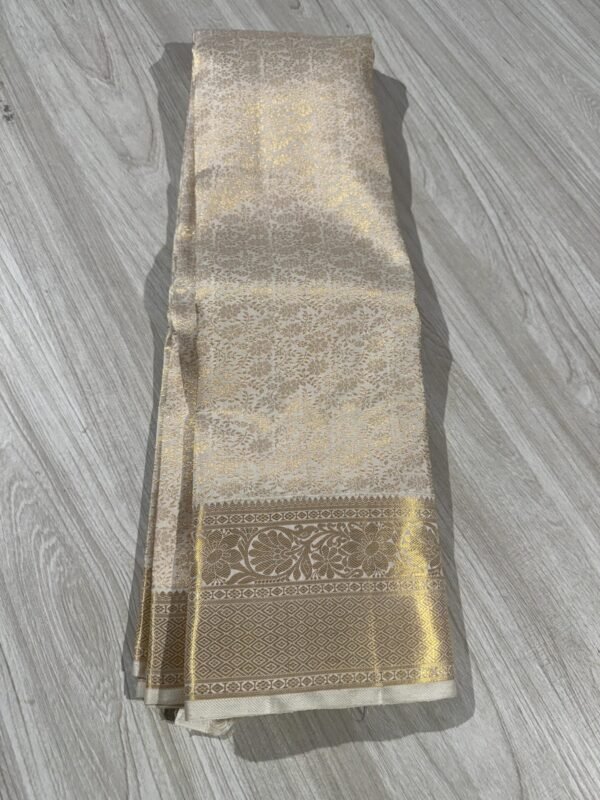 White Kanchipuram Silk Saree In Small Border