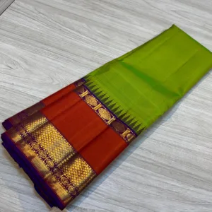 Parrot Green Kanchipuram Silk Saree With Orange Border & Purple Pallu