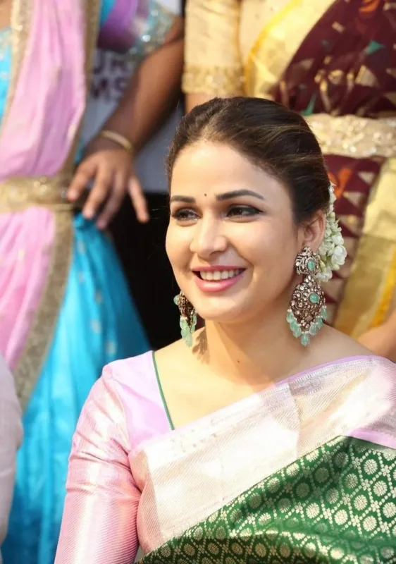 Lavanya Tripathi in Kanjivaram Silk Saree: A Graceful Blend of Green Grandeur and Pastel Pink Elegance 6 Lavanya Tripathi